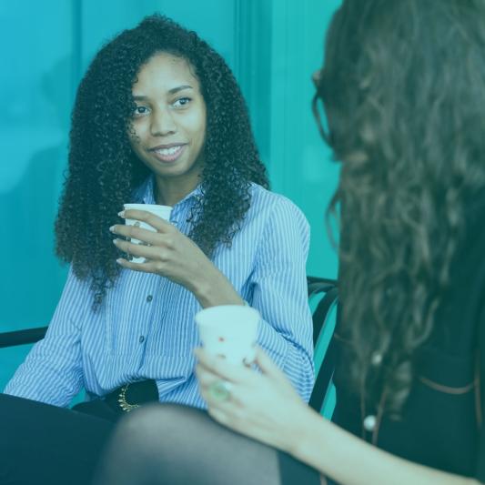 Two Saint-Gobain interns connecting on a break in their day
