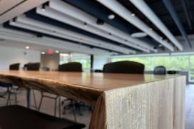 Salvaged wood is used for a countertop in the cafe area in the office.