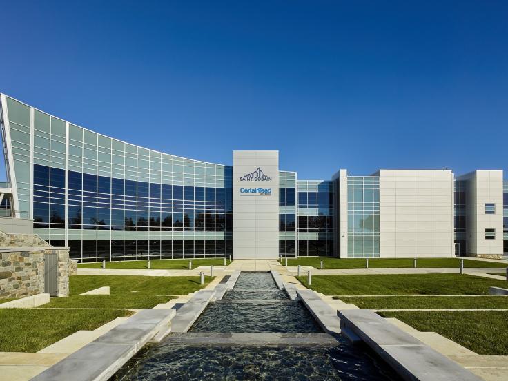 Corporate office building with Saint-Gobain and CertainTeed logos in the center