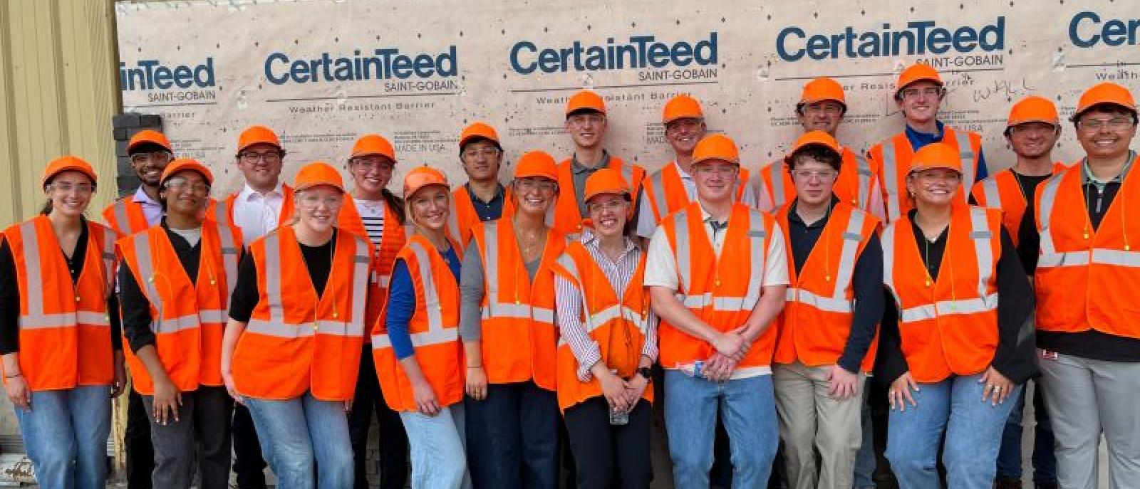 Group of Interns sharing hands-on experience at a CertainTeed plant during Saint-Gobain’s manufacturing engineering internships.